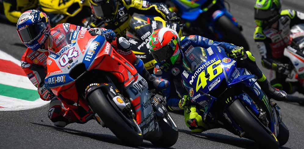 Rossi Keluhkan Gaya Dovizioso